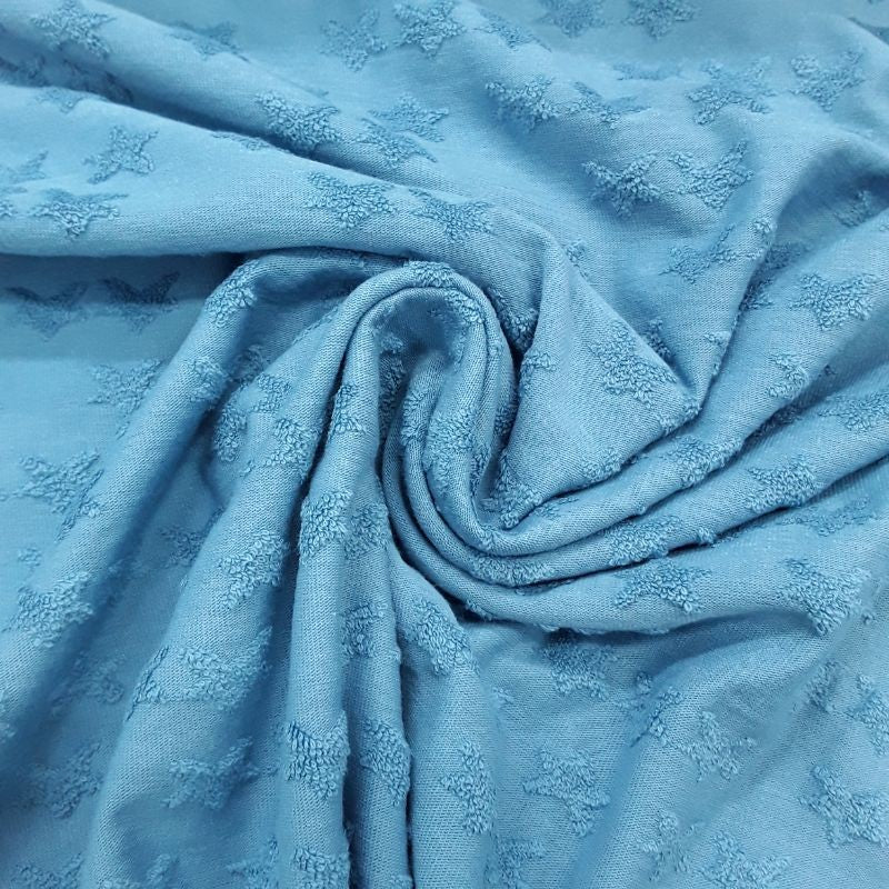 Punto camiseta estrella azul en relieve