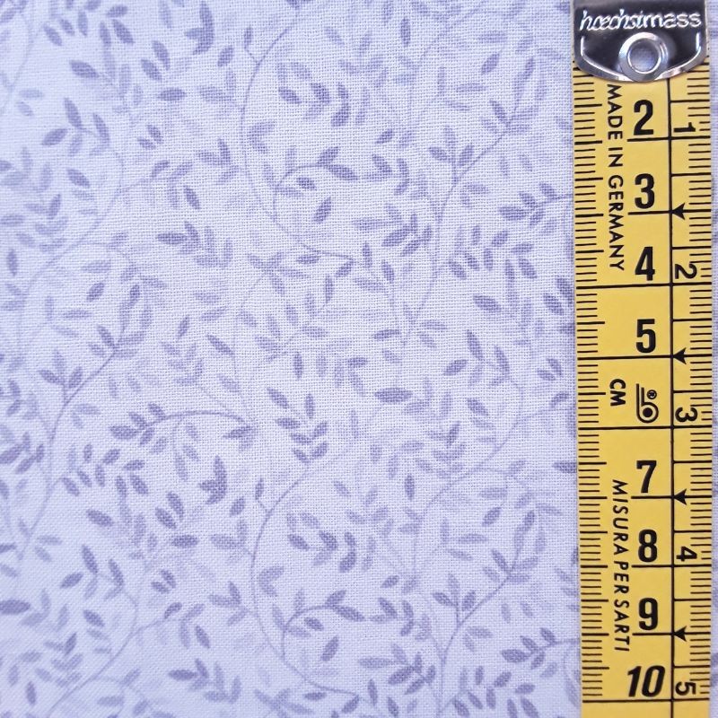 Tela patchwork hojitas gris