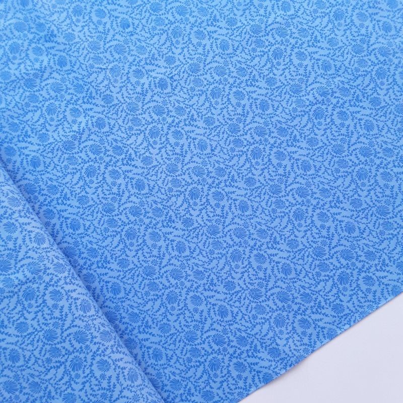 Tela patchwork conchas azules
