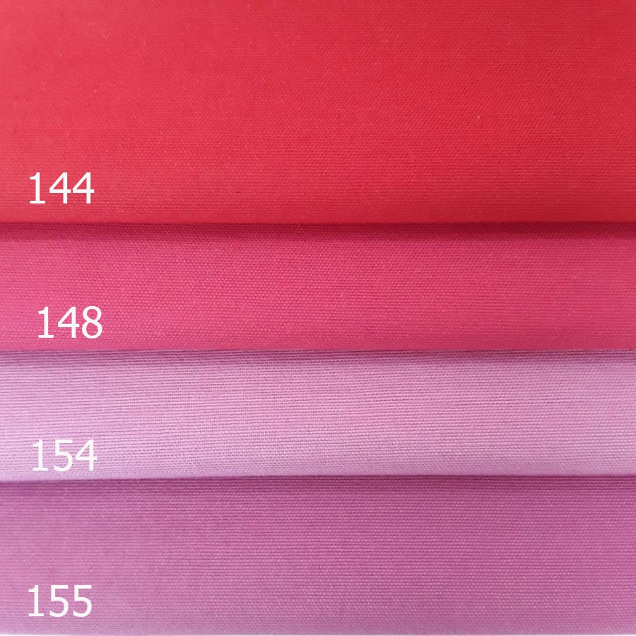 Loneta lisa color rojo y rosas