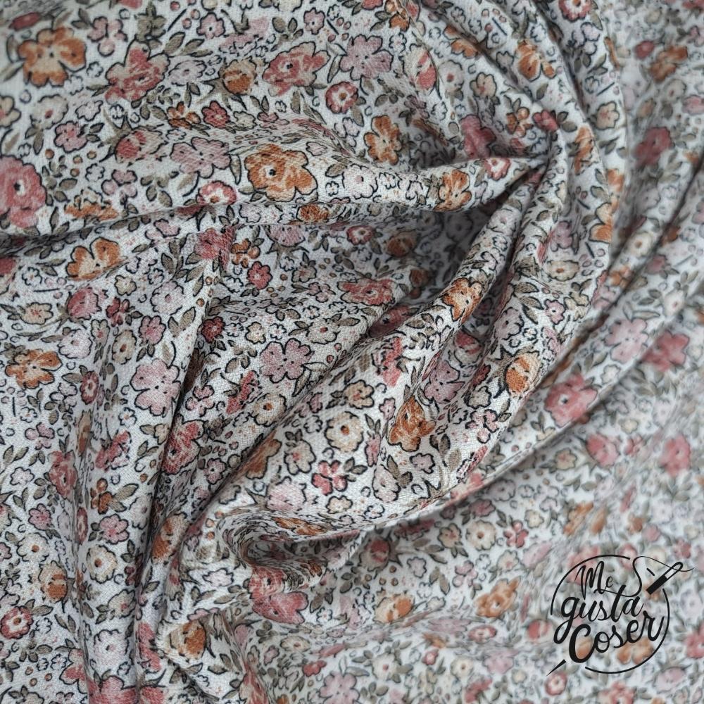 Tela de viyela de viscosa con flores pequeñas flores rosas y teja