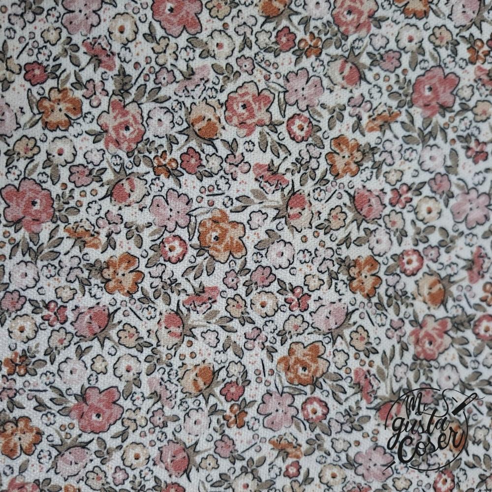 Tela de viyela de viscosa con flores pequeñas flores rosas y teja